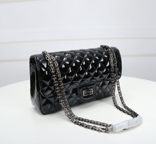The Noir Lumière Patent Flap Bag