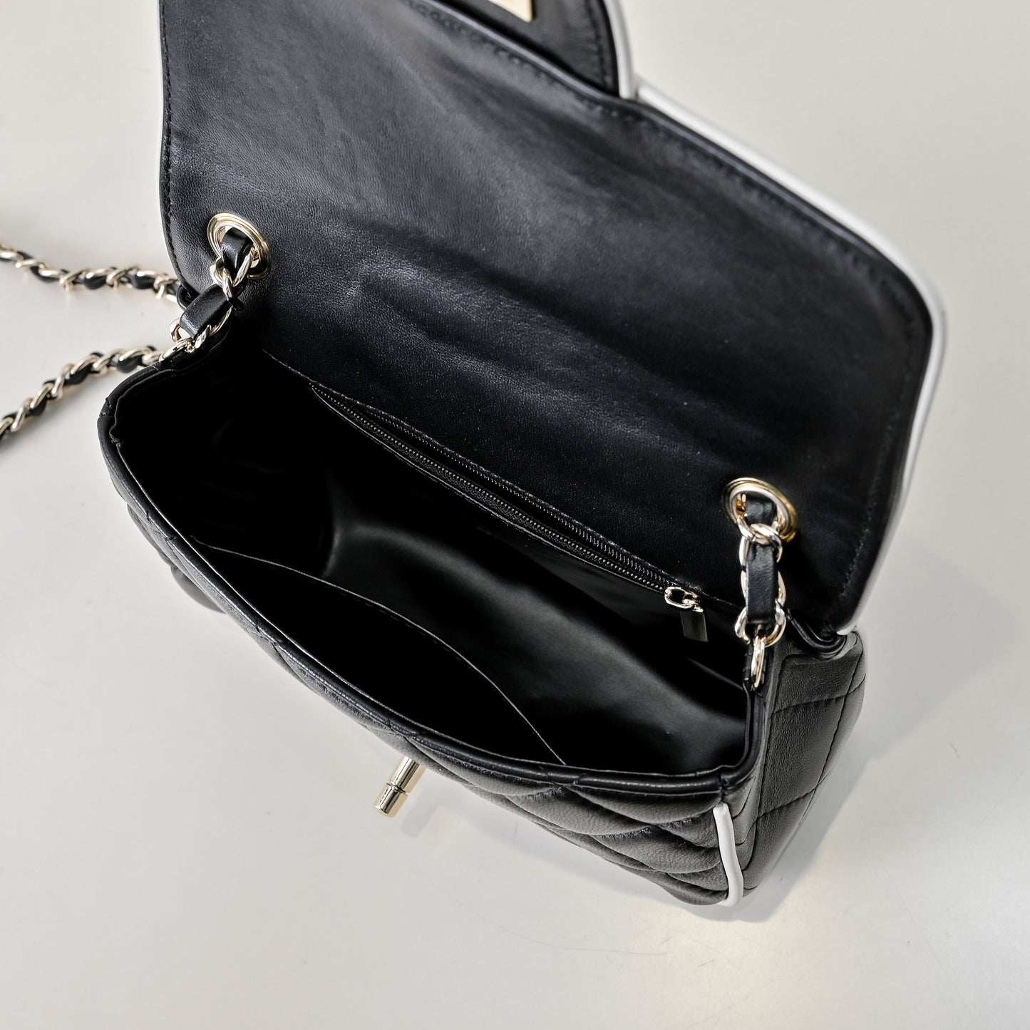 “Noir Mini Quilted” Leather Bag