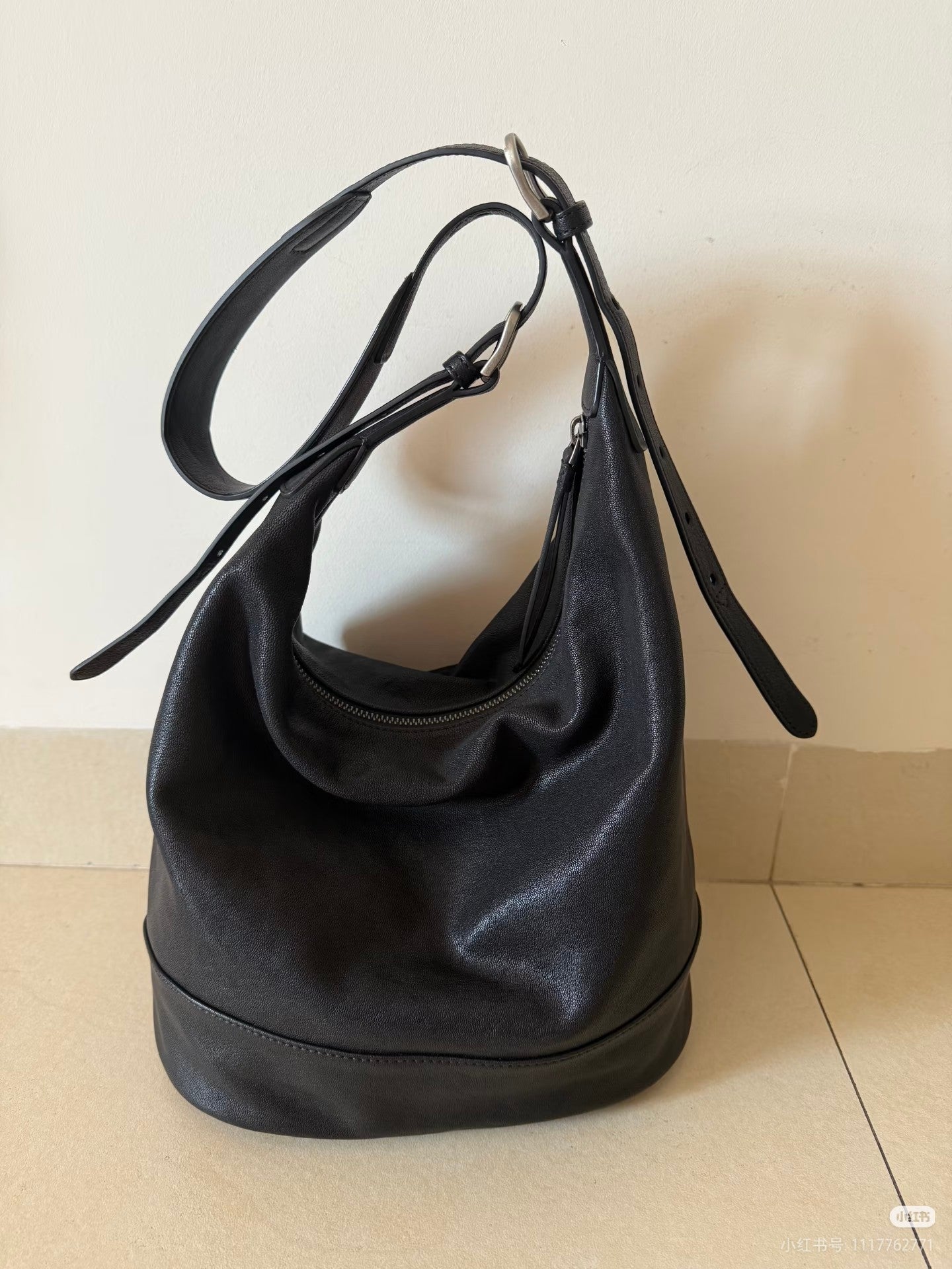 The Noir Voyage Convertible Leather Bucket Bag 
