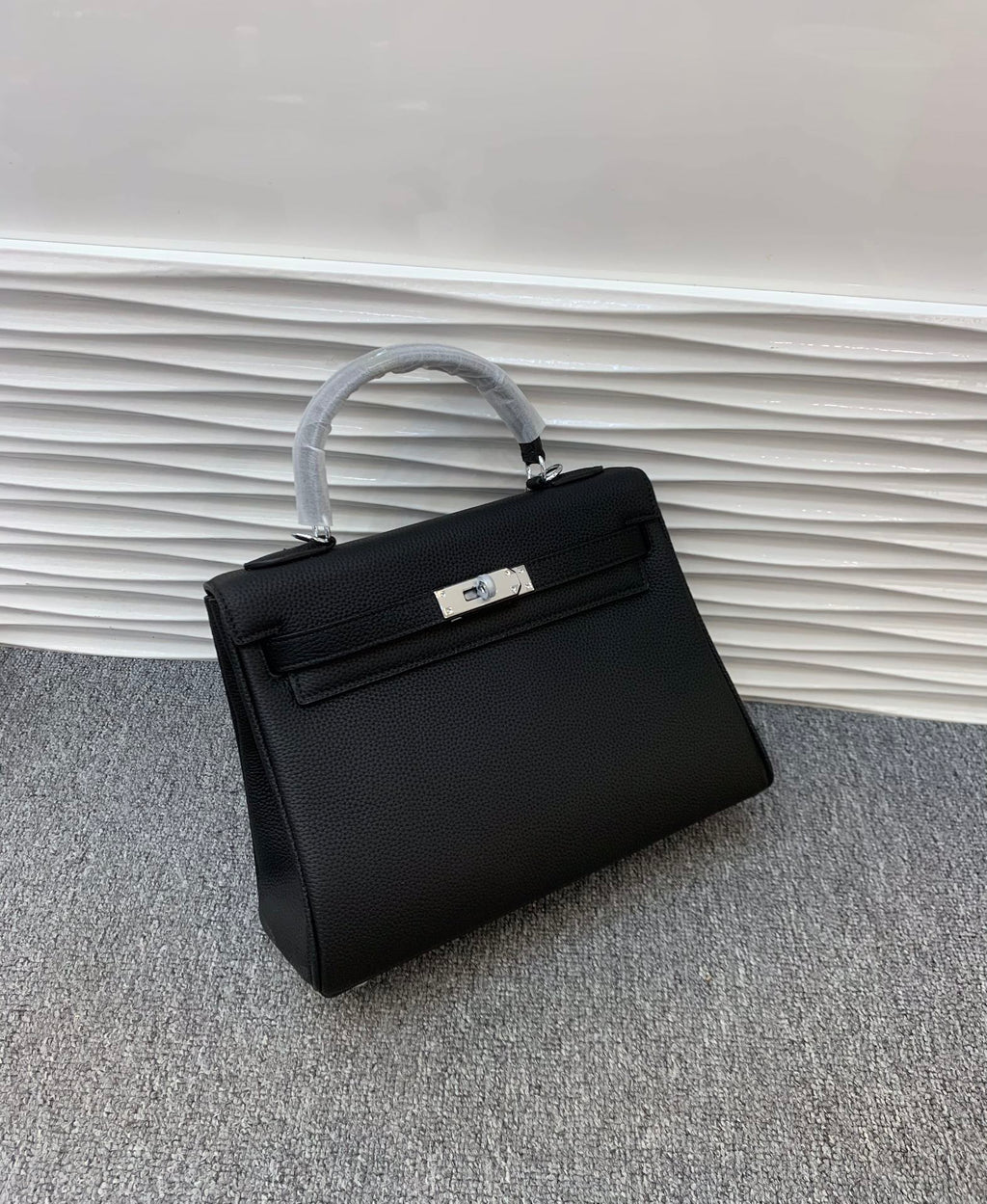 The Noir Heritage Structured Top Handle Bag