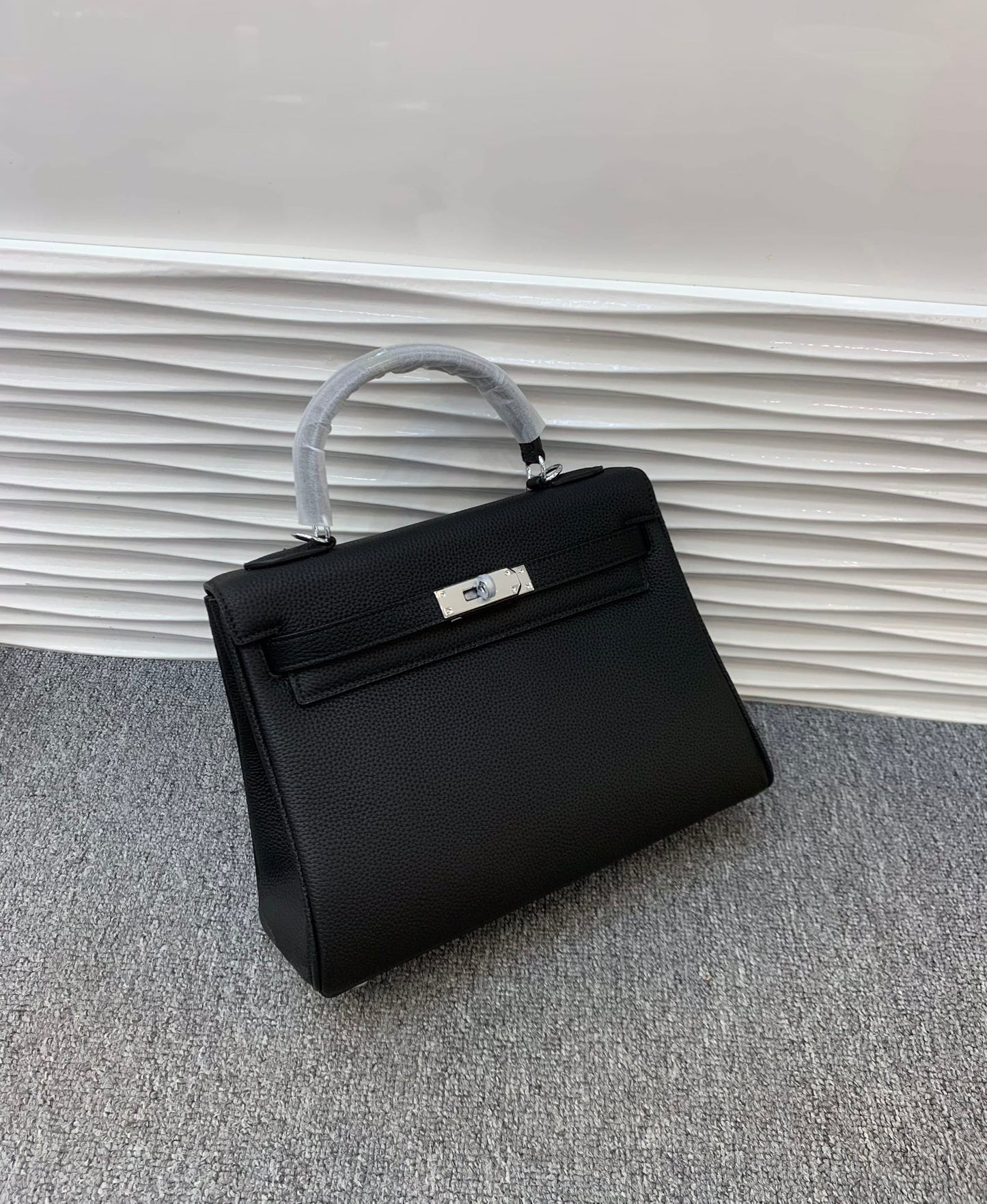 The Noir Heritage Structured Top Handle Bag