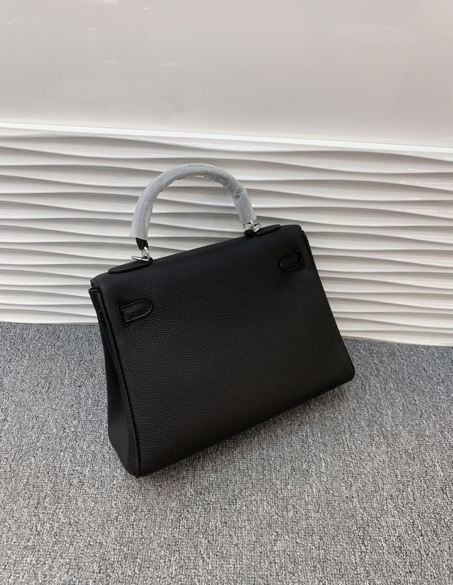 The Noir Heritage Structured Top Handle Bag