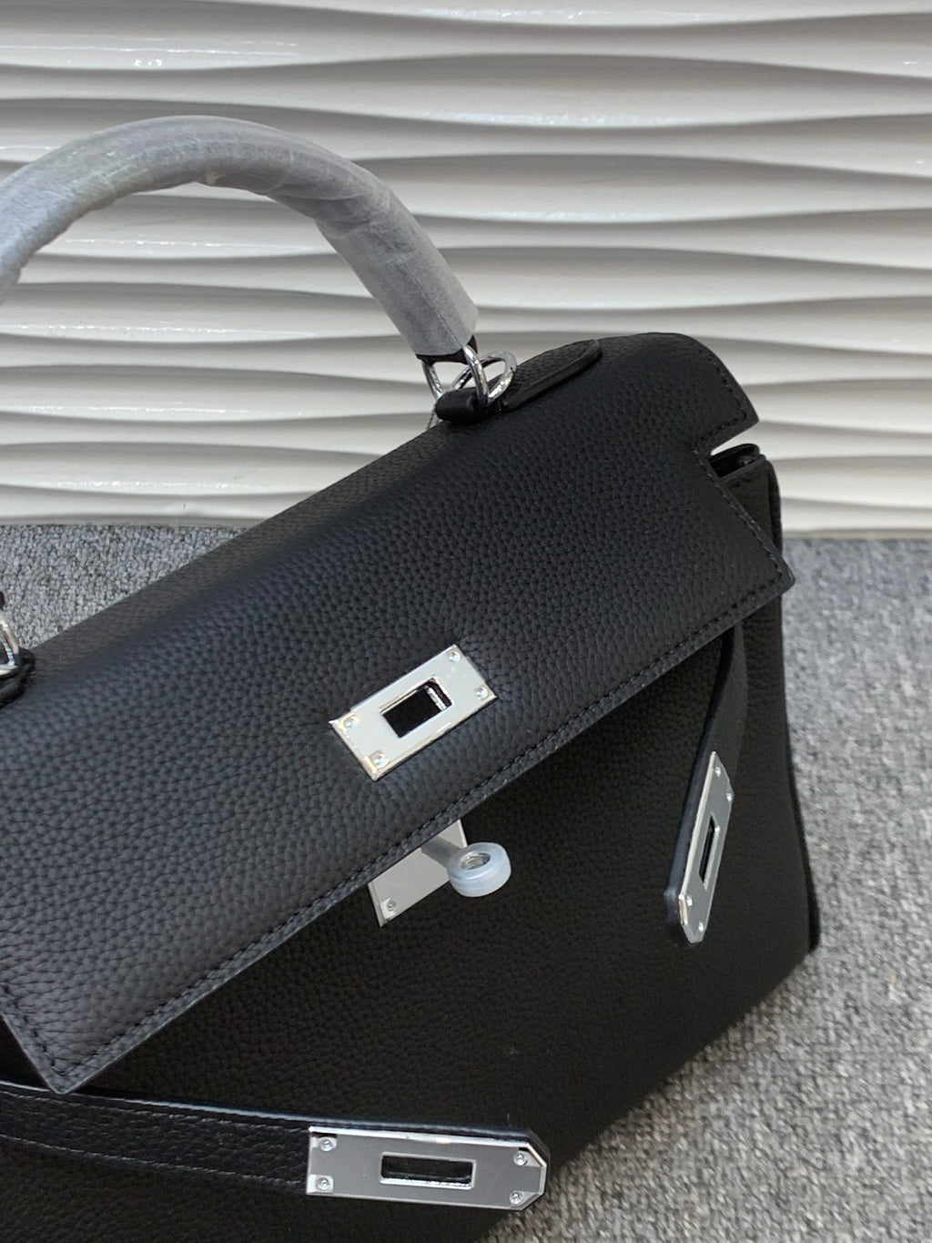 The Noir Heritage Structured Top Handle Bag