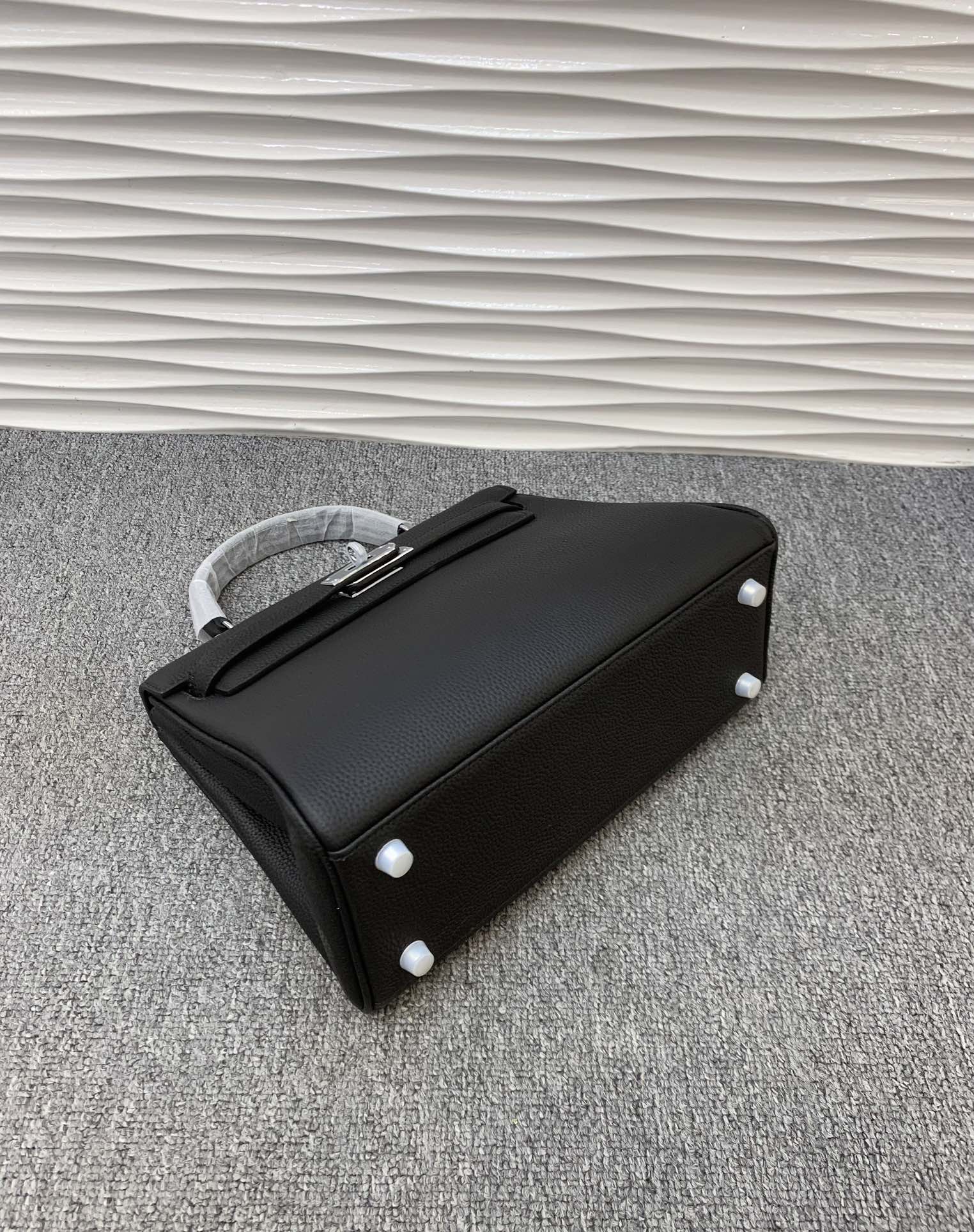 The Noir Heritage Structured Top Handle Bag