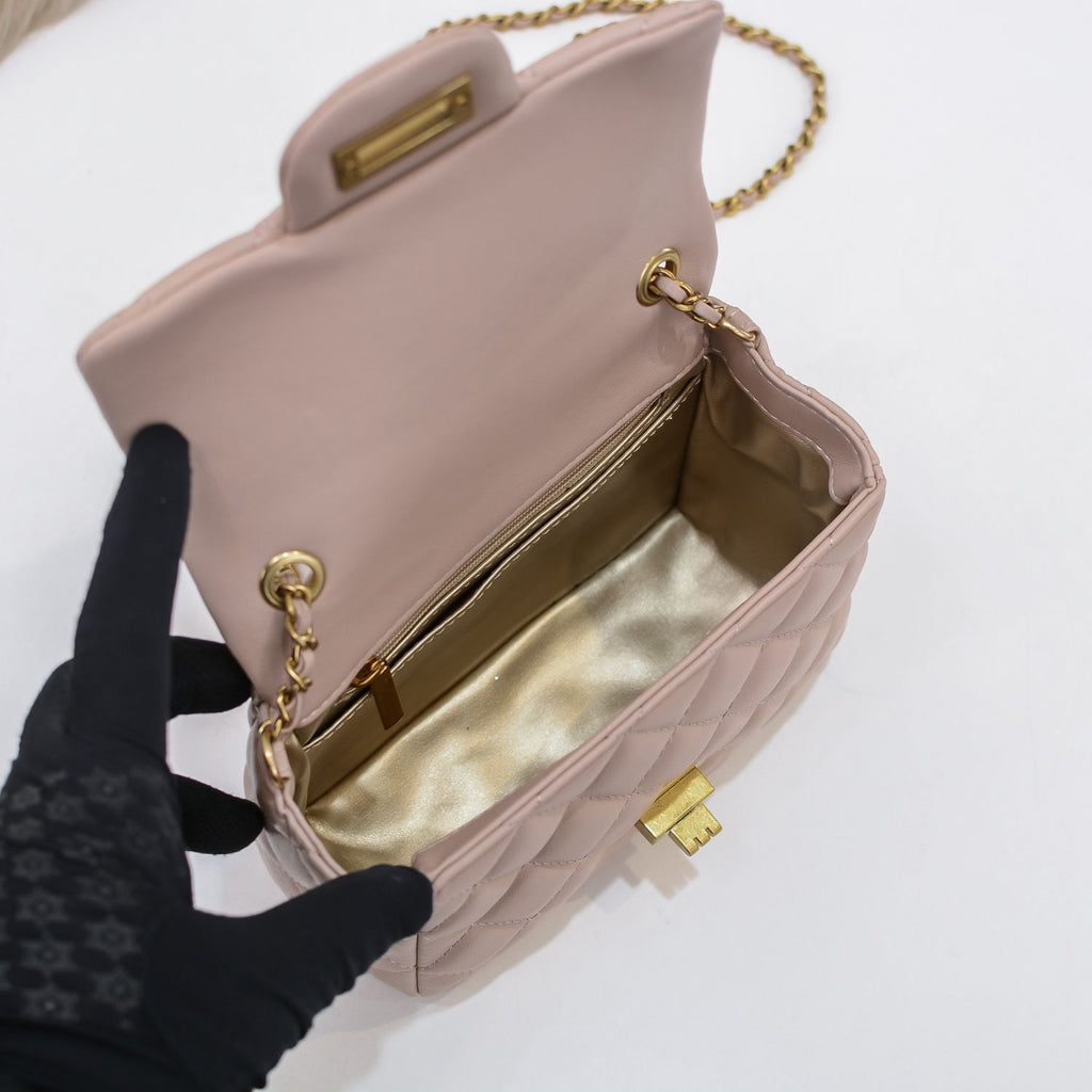 Quilted Pink HandBag w/Ball Chain - Leather