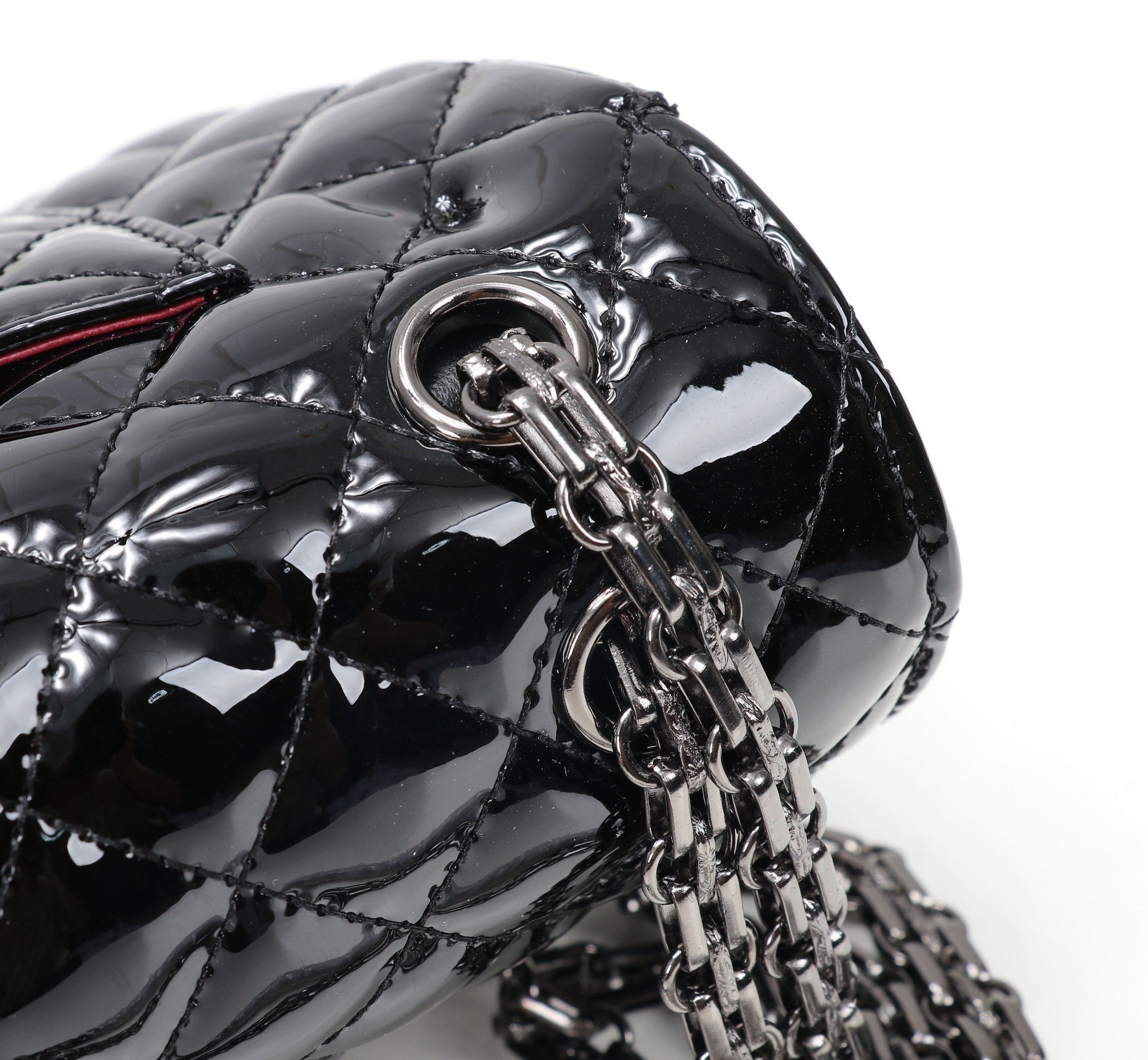 The Noir Lumière Patent Flap Bag