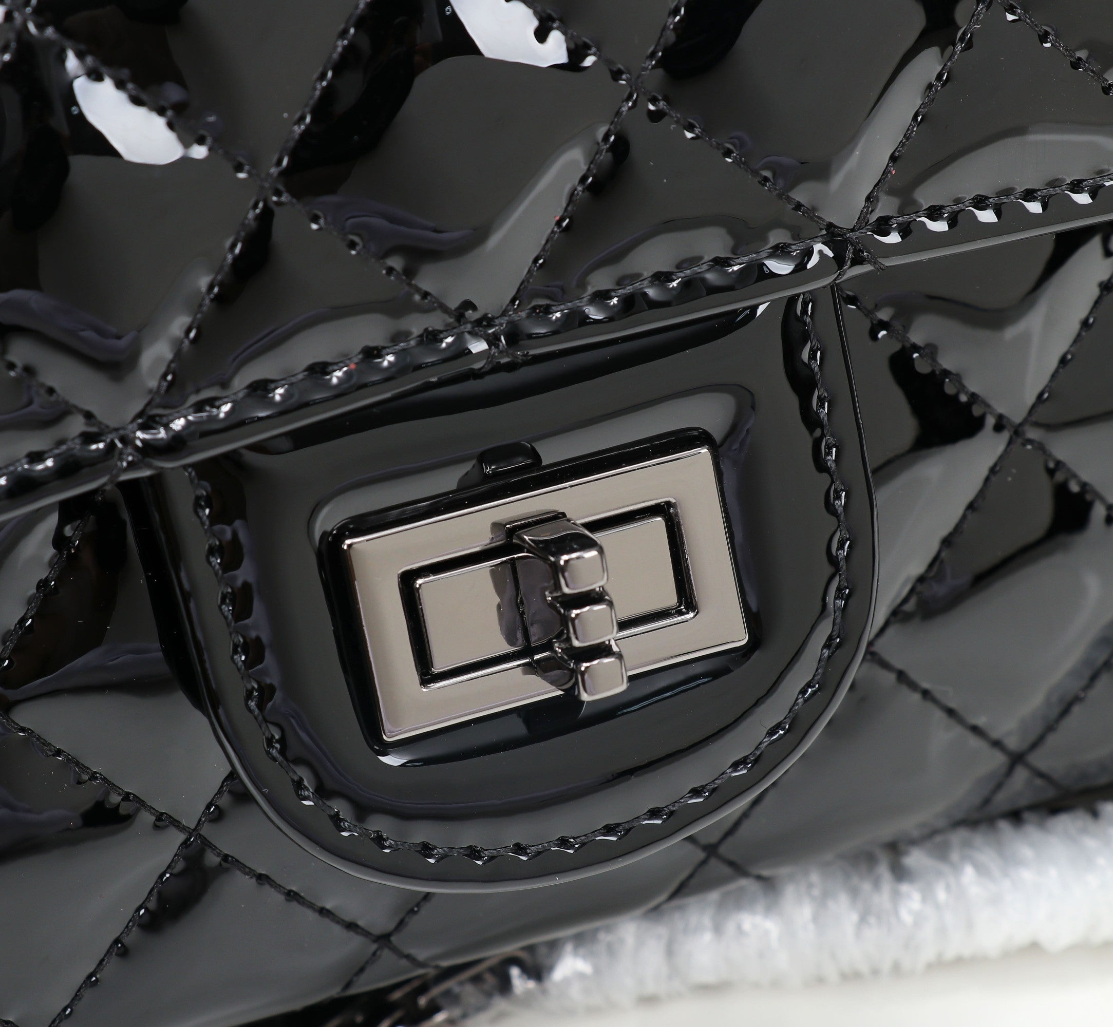 The Noir Lumière Patent Flap Bag