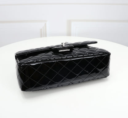 The Noir Lumière Patent Flap Bag