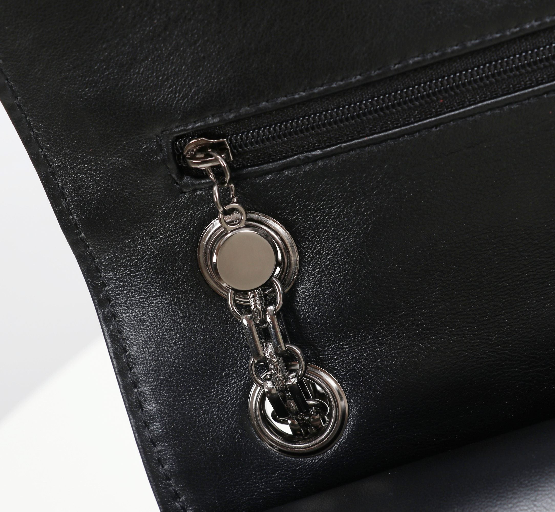 The Noir Lumière Patent Flap Bag