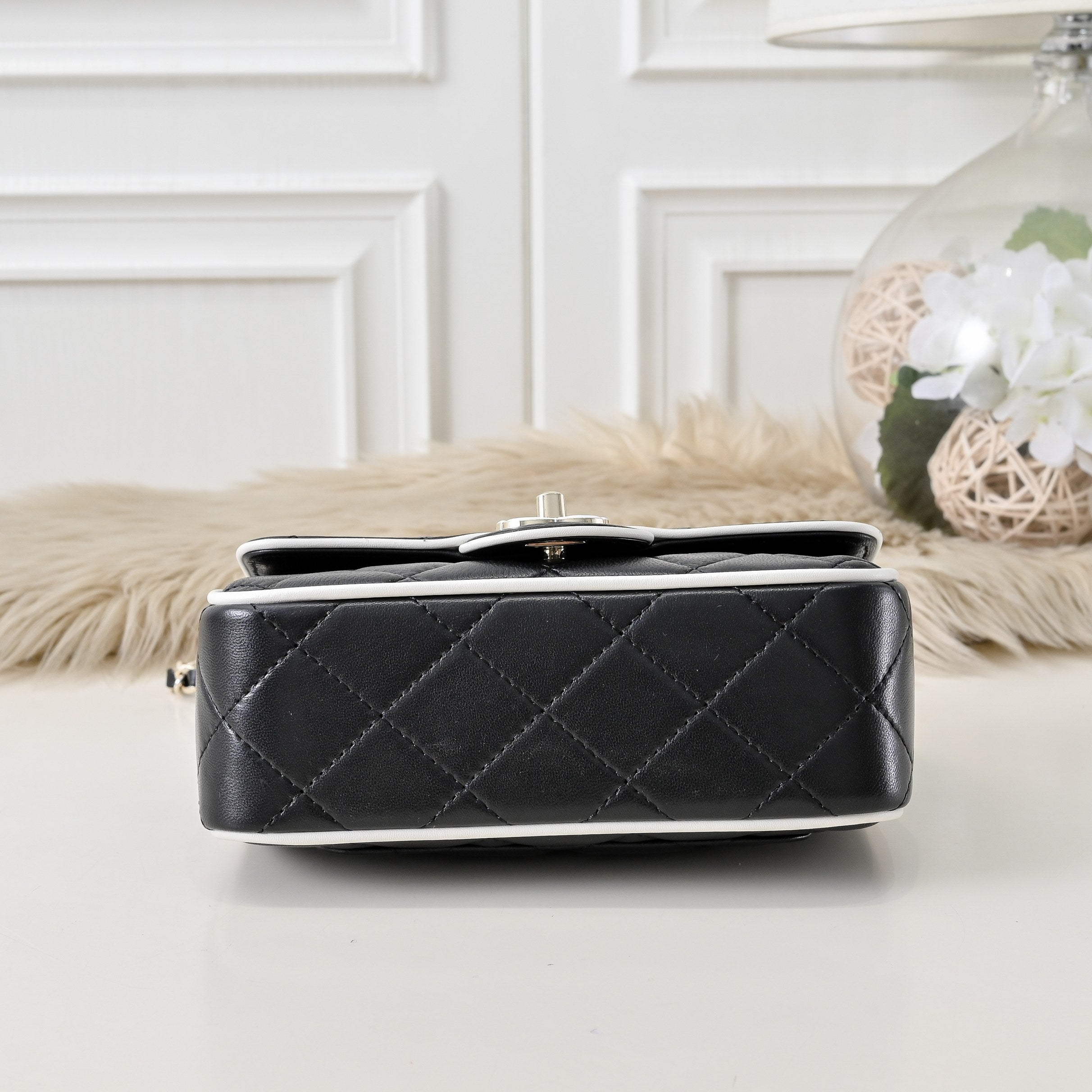“Noir Mini Quilted” Leather Bag