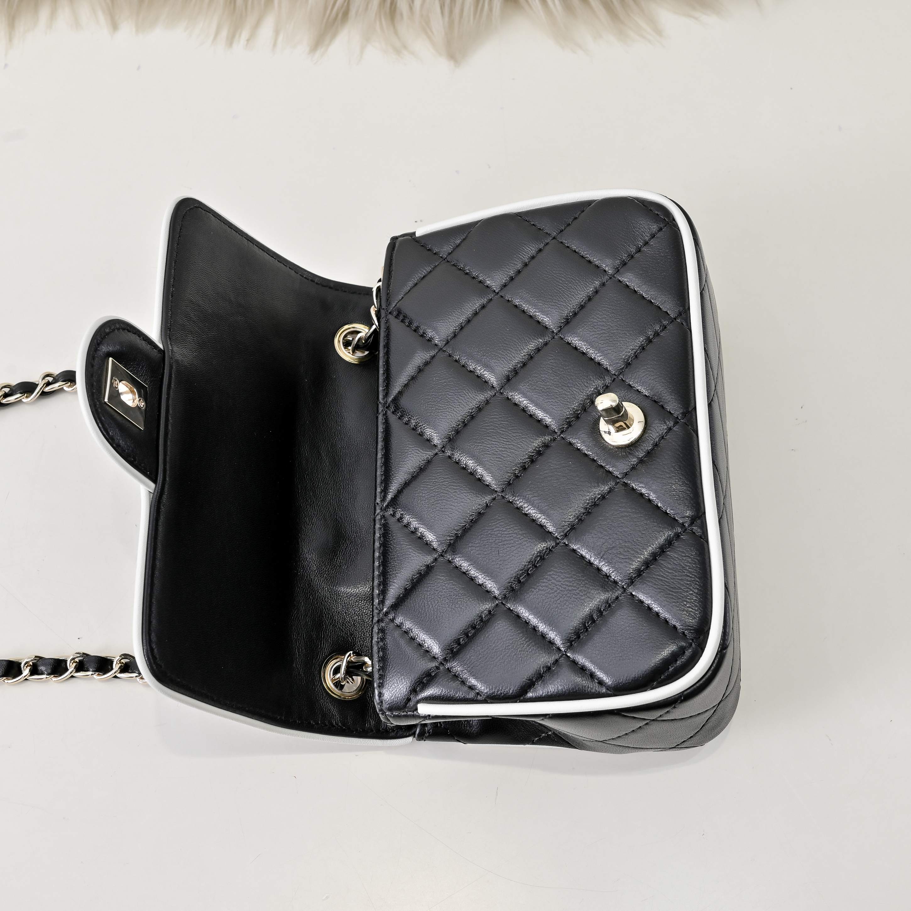 “Noir Mini Quilted” Leather Bag